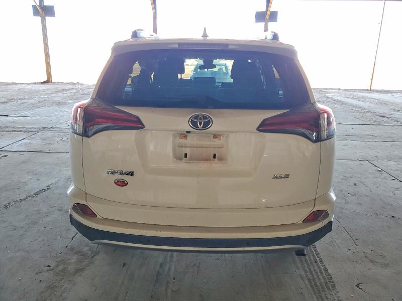 Photo 6 from auction – 2018 TOYOTA RAV4 with VIN JTMWFREV2JJ152973