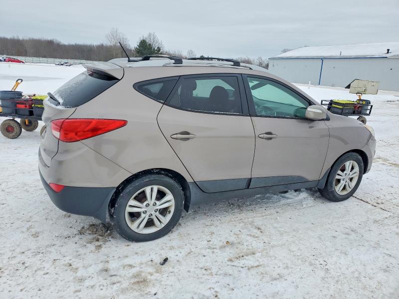 Photo 3 from auction – 2012 HYUNDAI TUCSON GLS with VIN KM8JUCAC3CU395576