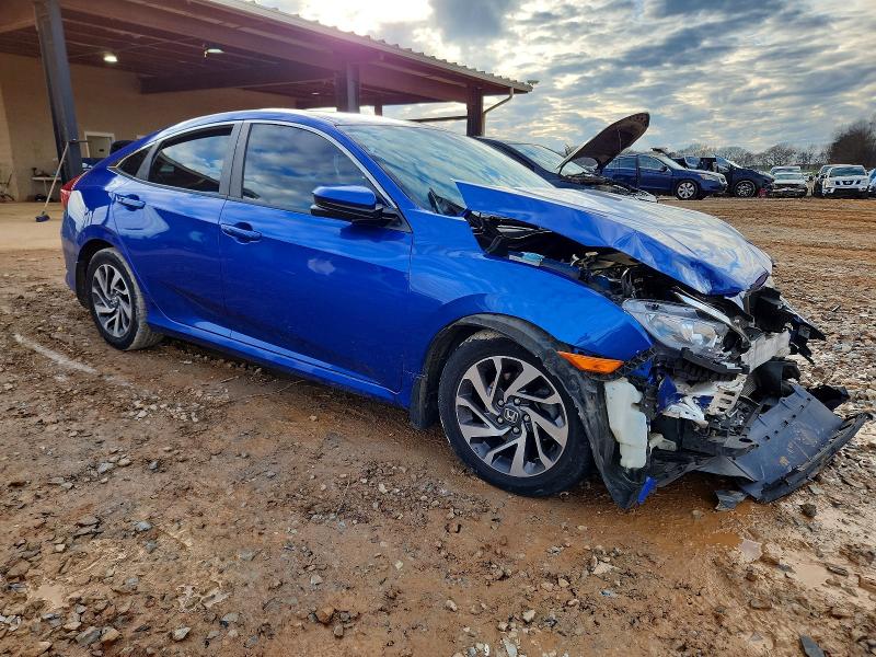 Photo 4 from auction – 2018 HONDA CIVIC EX with VIN 19XFC2F77JE012298