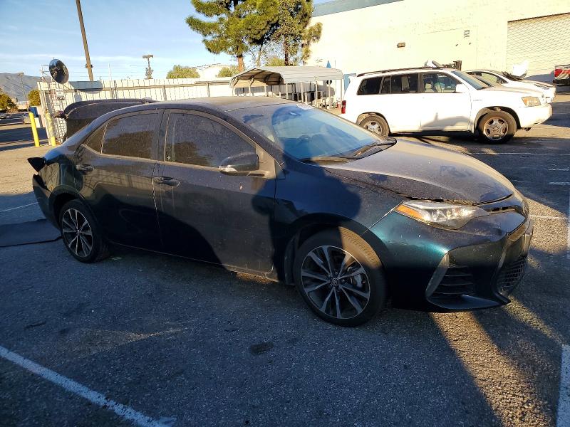 Photo 4 from auction – 2017 TOYOTA COROLLA L with VIN 5YFBURHE0HP711510