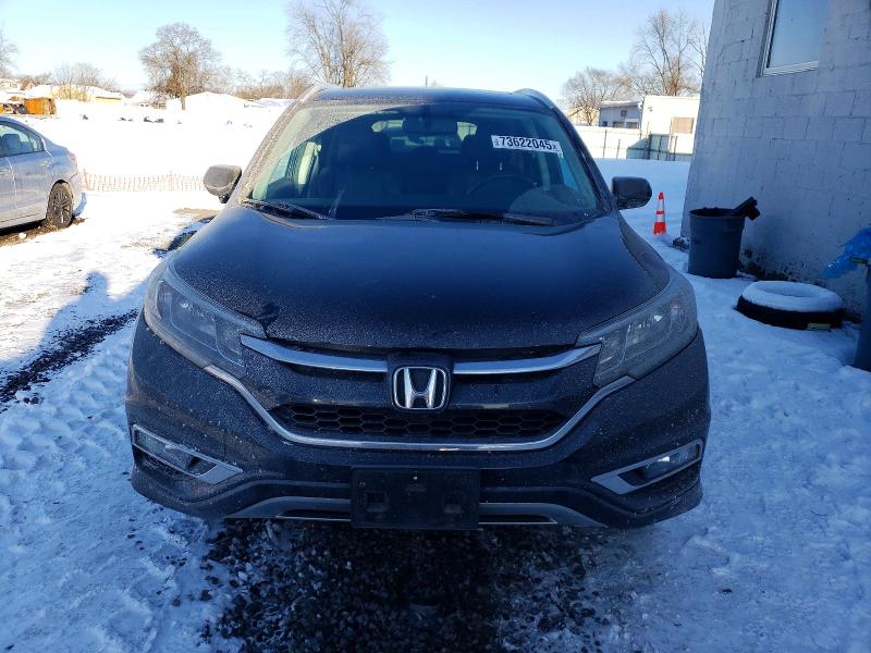 Photo 5 from auction – 2015 HONDA CR-V EXL with VIN 2HKRM4H75FH675701