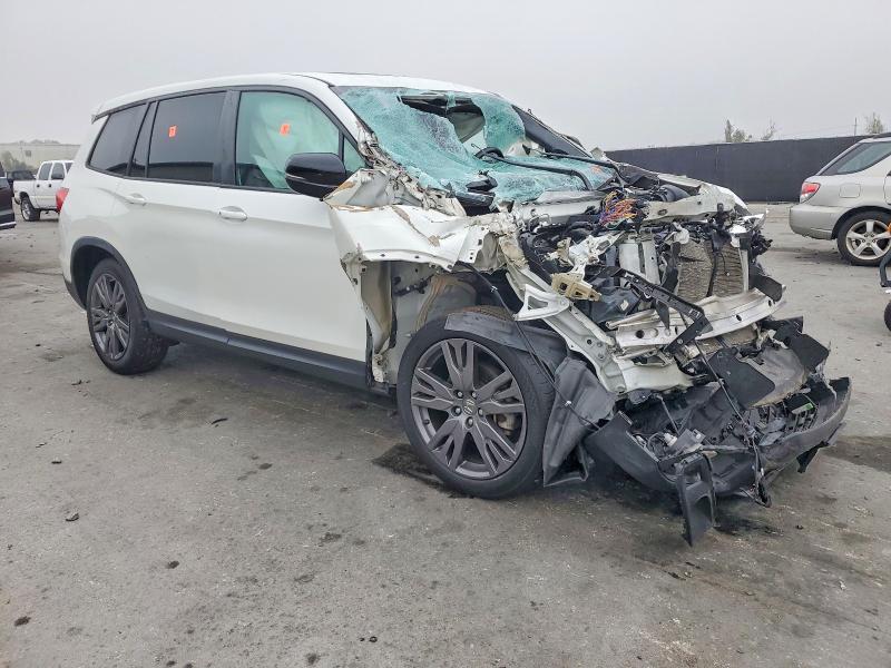 Photo 4 from auction – 2020 HONDA PASSPORT E with VIN 5FNYF8H55LB001358
