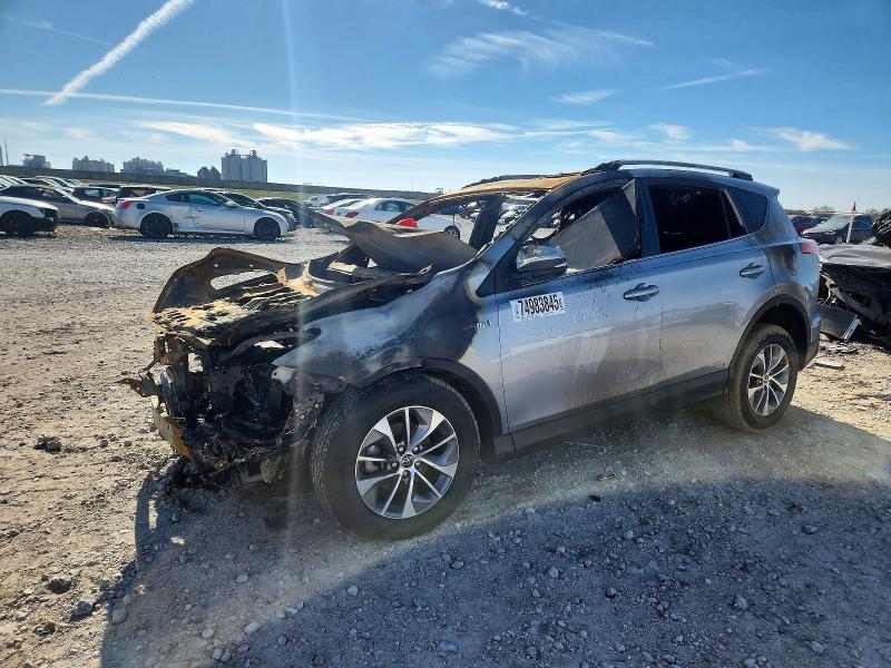 TOYOTA RAV4 HV LE 2018 with VIN JTMRJREV2JD225575 - Photo from auction