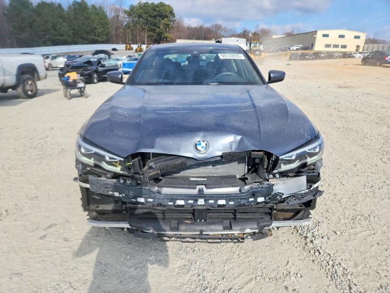 Photo 5 from auction – 2021 BMW 330I with VIN 3MW5R1J03M8C14912
