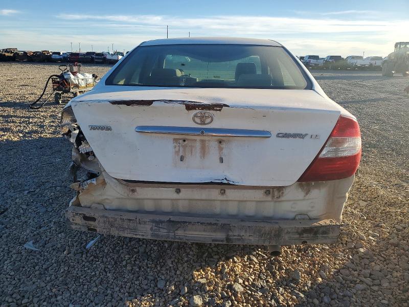 Photo 6 from auction – 2002 TOYOTA CAMRY LE with VIN JTDBE32KX20024464