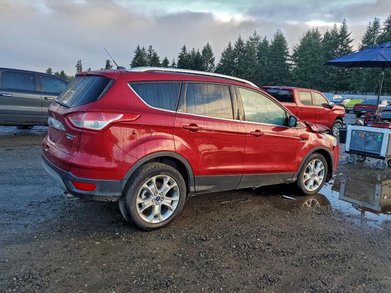 Photo 3 from auction – 2016 FORD ESCAPE TIT with VIN 1FMCU9J95GUC63375