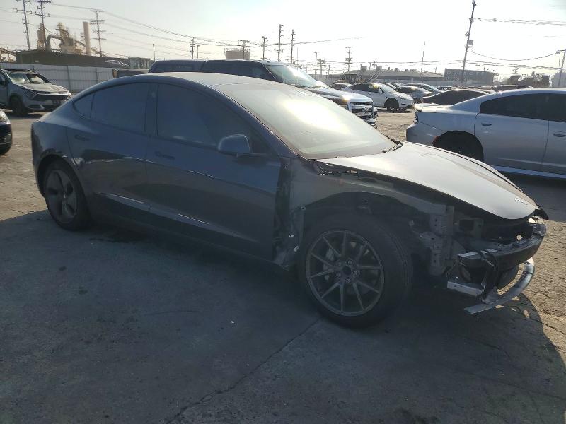 Photo 4 from auction – 2021 TESLA MODEL 3 with VIN 5YJ3E1EA6MF875290