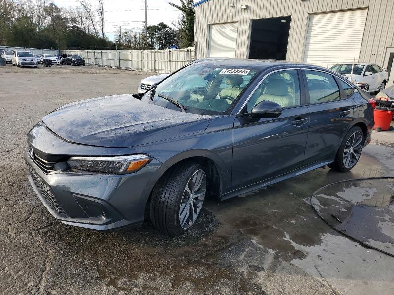 HONDA CIVIC 2023 with VIN 2HGFE1F92PH323531 - Photo from auction