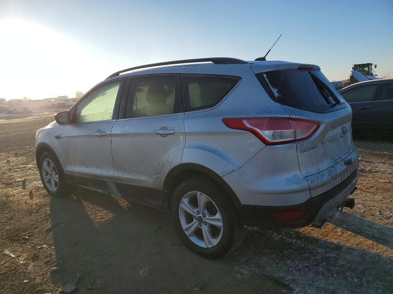 Photo 2 from auction – 2016 FORD ESCAPE with VIN 1FMCU9GX6GUB20716