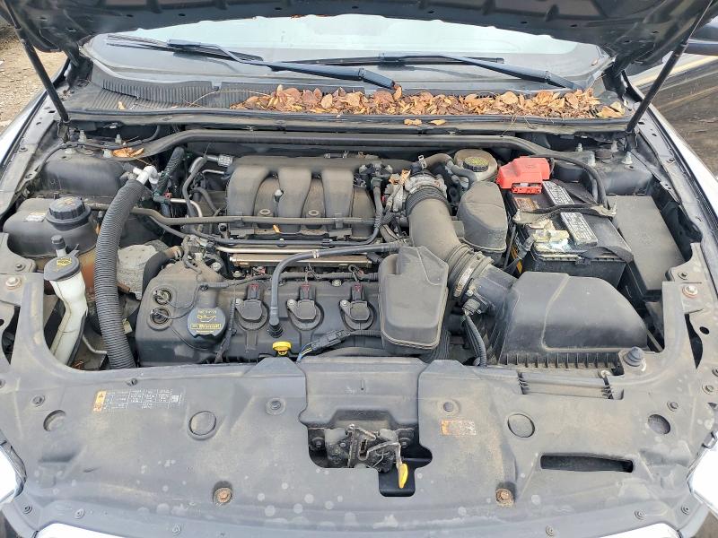 Photo 11 from auction – 2013 FORD TAURUS SEL with VIN 1FAHP2E80DG220752