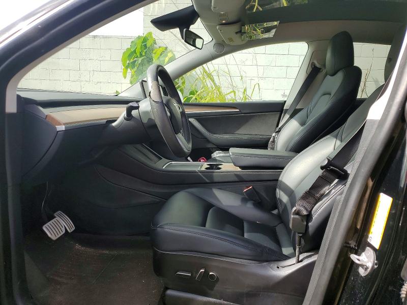 Photo 7 from auction – 2023 TESLA MODEL Y with VIN 7SAYGDEF6PF666975