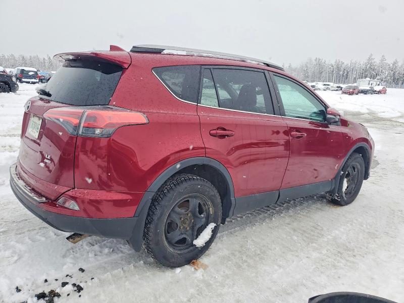 Photo 3 from auction – 2018 TOYOTA RAV4 LE with VIN 2T3BFREV9JW840484