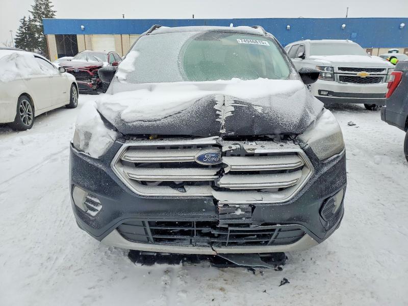 Photo 5 from auction – 2019 FORD ESCAPE with VIN 1FMCU9HDXKUA81237
