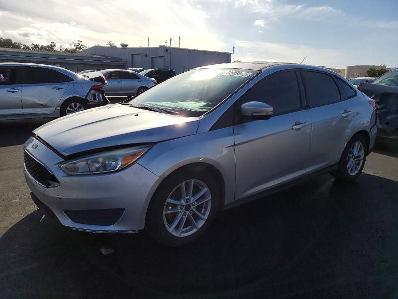 FORD FOCUS 2015 with VIN 1FADP3F28FL307646 - Photo from auction
