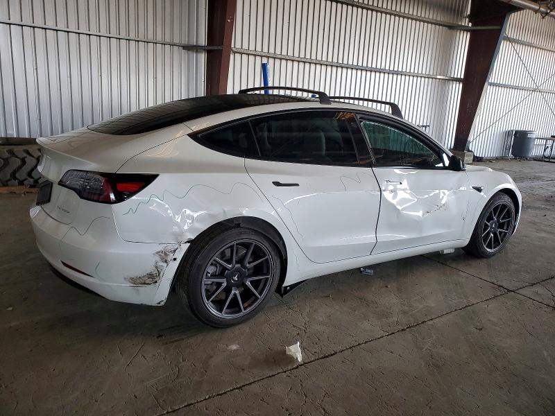 Photo 3 from auction – 2021 TESLA MODEL 3 with VIN 5YJ3E1EB9MF993052