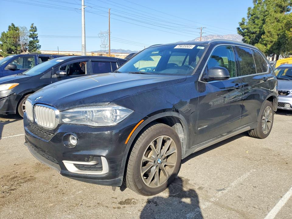 BMW X5 2017 with VIN 5UXKR2C54H0U19979 - Photo from auction