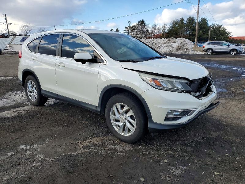 Photo 4 from auction – 2015 HONDA CR-V with VIN 5J6RM4H57FL043612