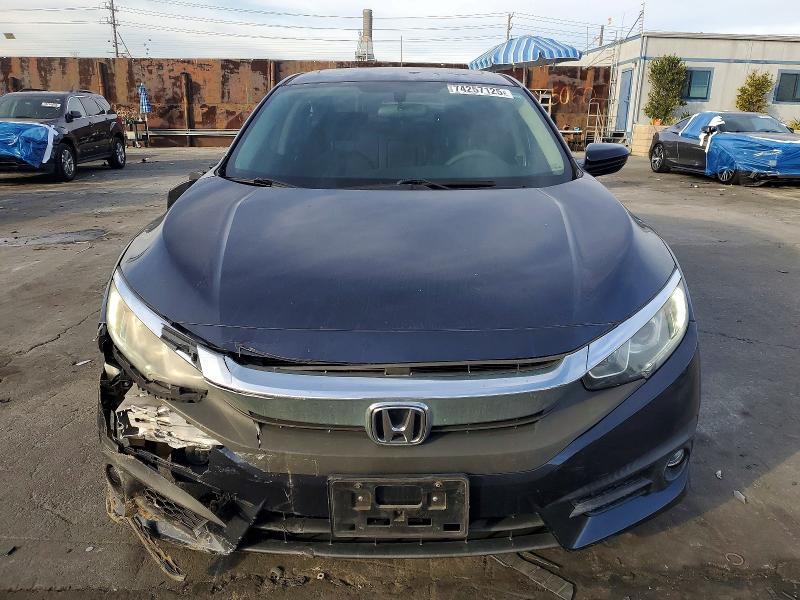 Photo 5 from auction – 2017 HONDA CIVIC with VIN 2HGFC1F34HH640553