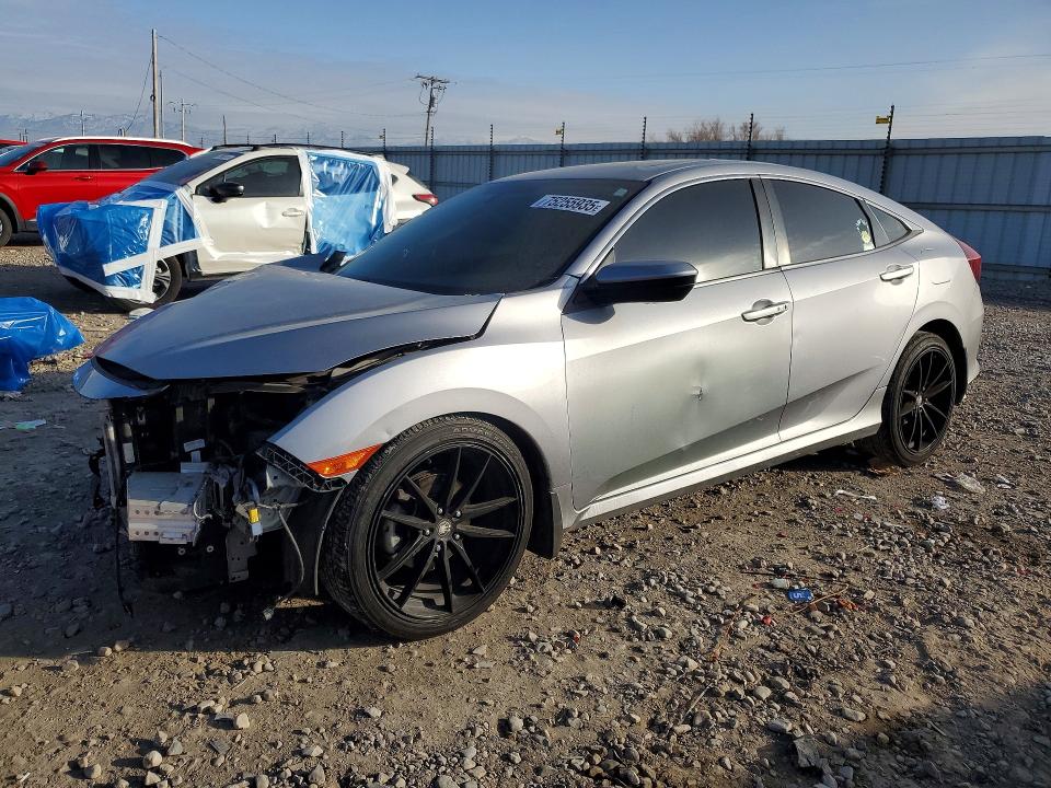 HONDA CIVIC 2016 with VIN 2HGFC1F39GH633838 - Photo from auction