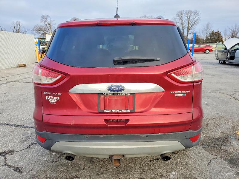 Photo 6 from auction – 2014 FORD ESCAPE TIT with VIN 1FMCU9J97EUA93095