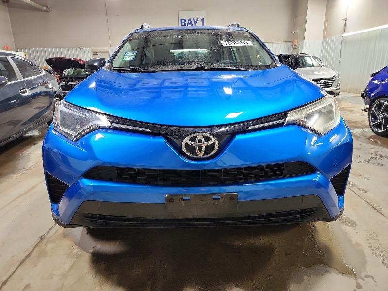 Photo 5 from auction – 2016 TOYOTA RAV4 LE with VIN JTMBFREV4GJ077507