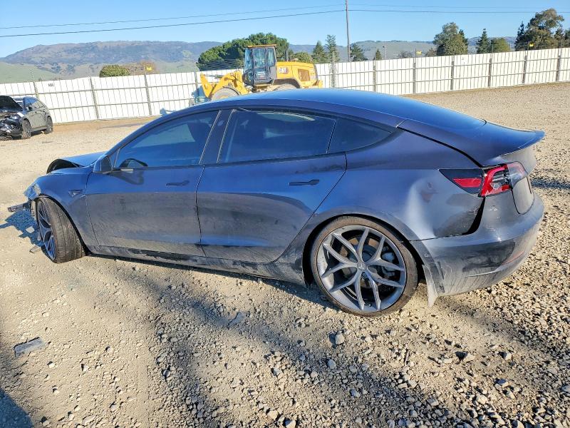 Photo 2 from auction – 2021 TESLA MODEL 3 with VIN 5YJ3E1EB4MF003103