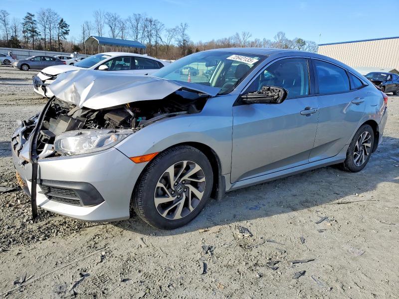 HONDA CIVIC EX 2017 with VIN 19XFC2F70HE001380 - Photo from auction