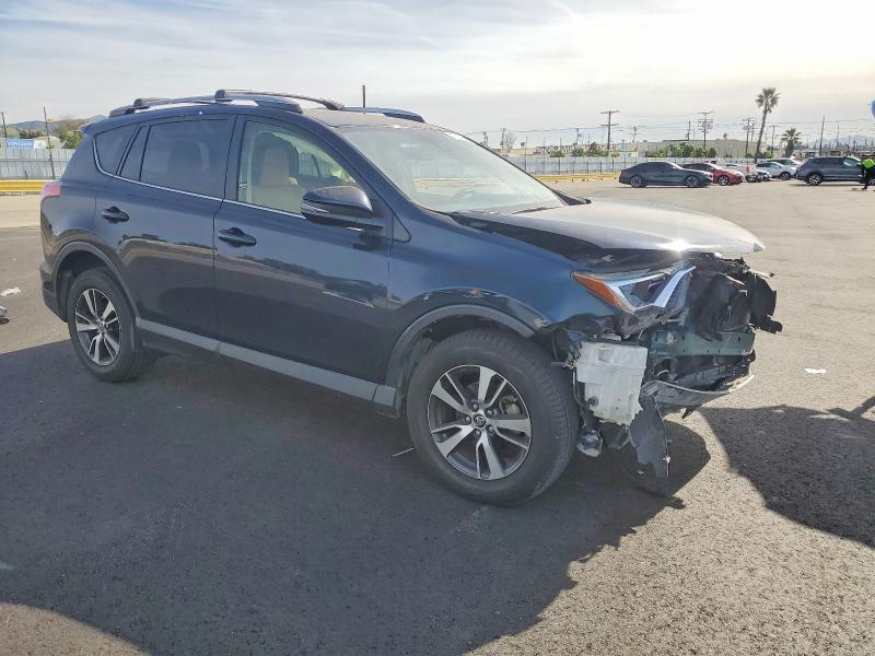 Photo 4 from auction – 2017 TOYOTA RAV4 with VIN JTMWFREV5HJ714620