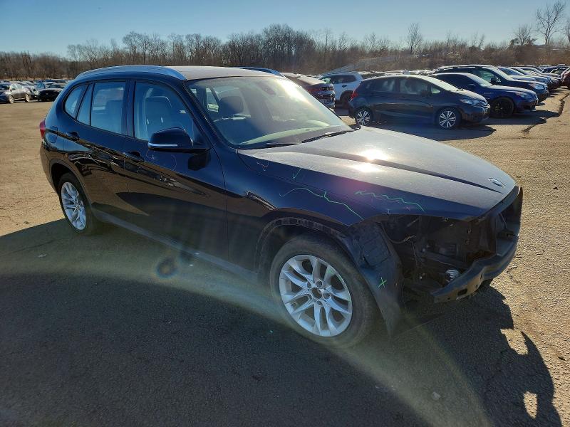 Photo 4 from auction – 2015 BMW X1 XDRIVE2 with VIN WBAVL1C57FVY33880