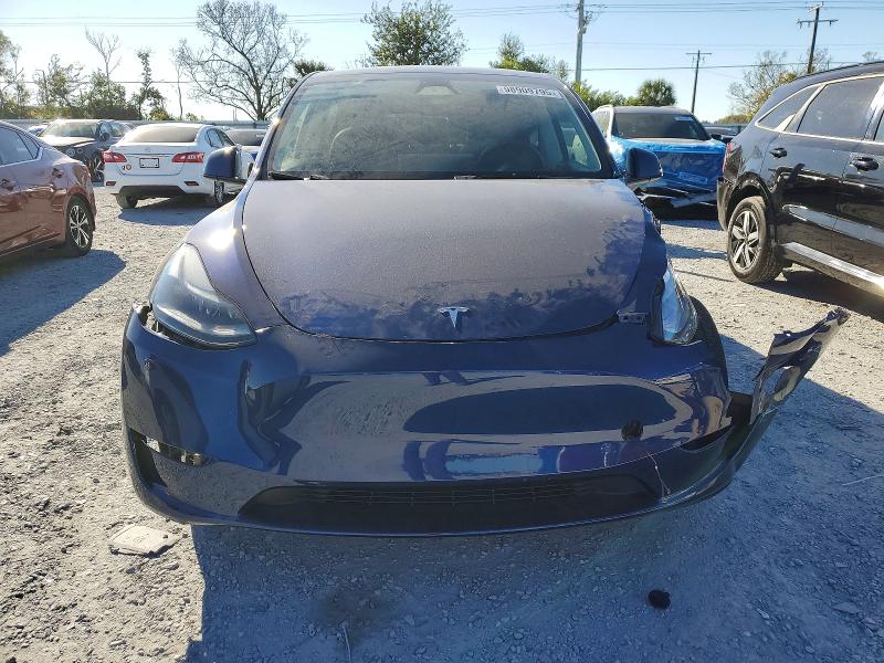 Photo 5 from auction – 2023 TESLA MODEL Y with VIN 7SAYGDEE0PA203072