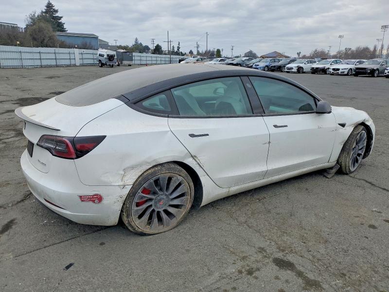 Photo 3 from auction – 2021 TESLA MODEL 3 with VIN 5YJ3E1EC8MF074362