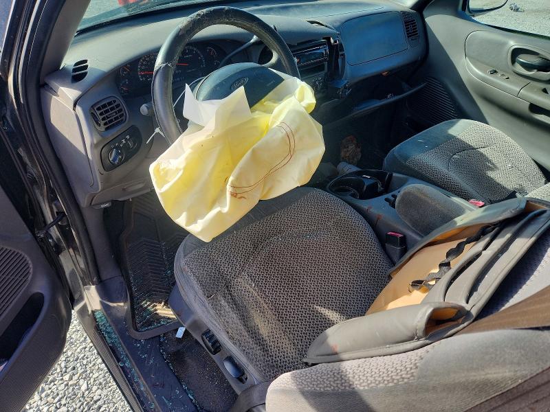 Photo 8 from auction – 1999 FORD F150 with VIN 1FTRX18L8XNB82339