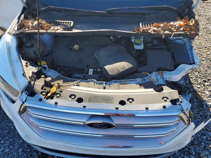 Photo 11 from auction – 2018 FORD ESCAPE SE with VIN 1FMCU0GD0JUA73045