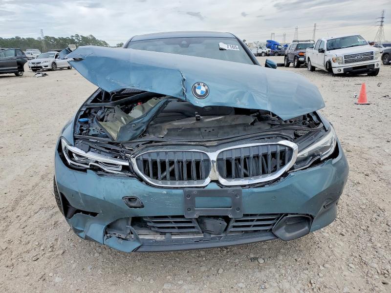 Photo 5 from auction – 2021 BMW 330I with VIN 3MW5R1J01M8B86155