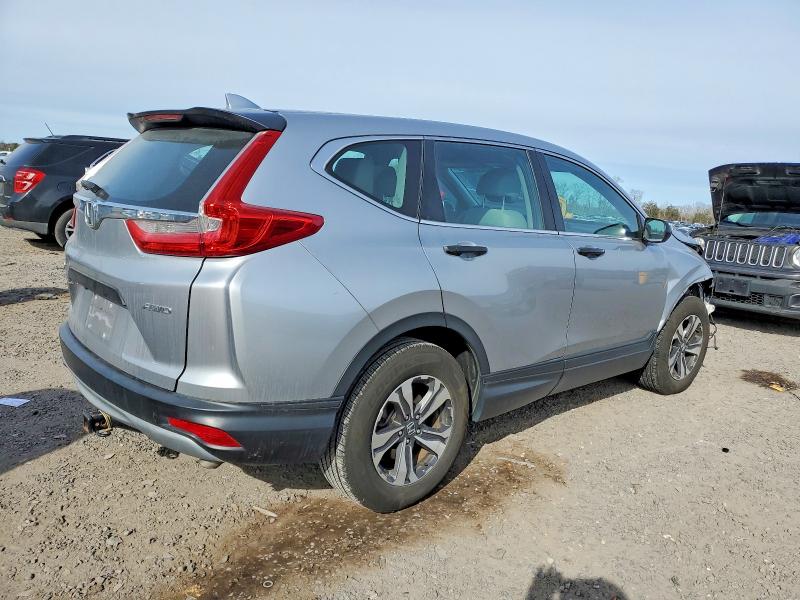 Photo 3 from auction – 2018 HONDA CR-V LX with VIN 2HKRW6H32JH225631