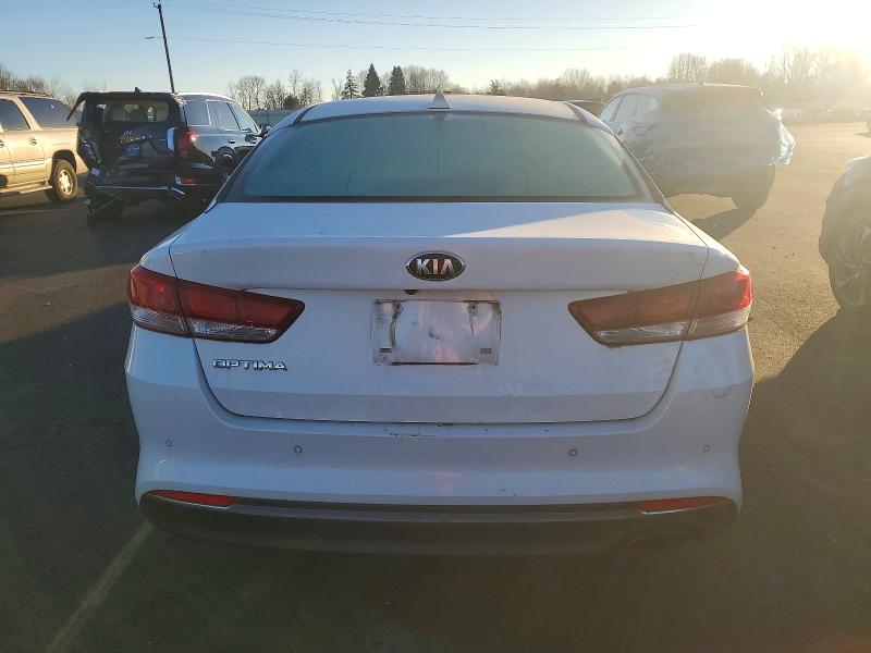 Photo 6 from auction – 2018 KIA OPTIMA LX with VIN 5XXGT4L37JG258664