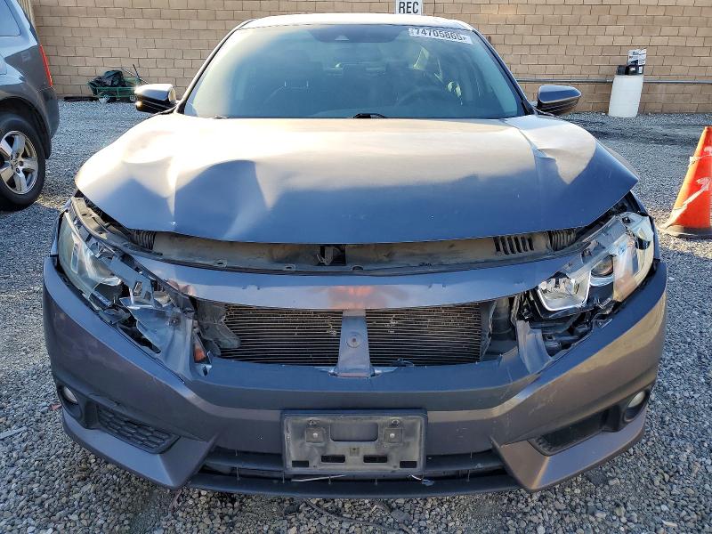 Photo 5 from auction – 2017 HONDA CIVIC with VIN 2HGFC1F4XHH652697