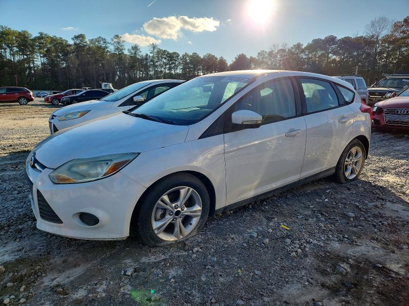 FORD FOCUS 2013 with VIN 1FADP3K25DL338775 - Photo from auction
