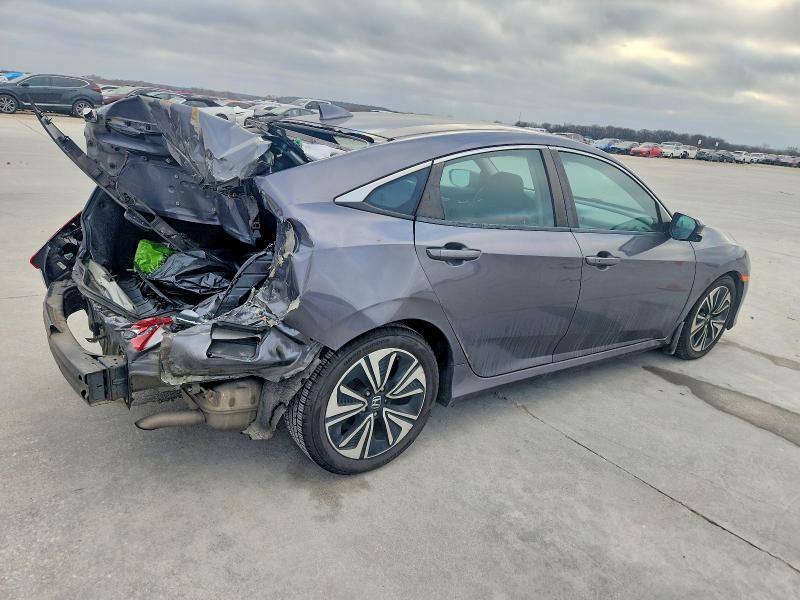 Photo 3 from auction – 2016 HONDA CIVIC with VIN 2HGFC1F39GH642930