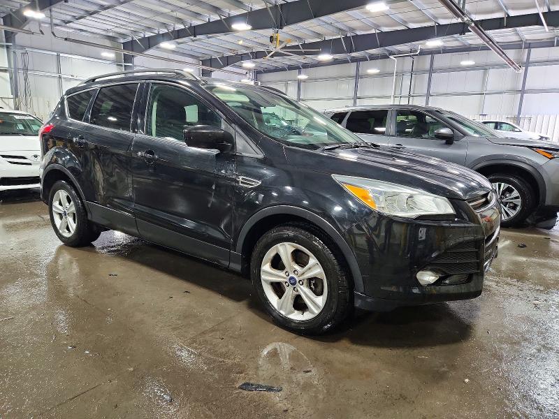 Photo 4 from auction – 2015 FORD ESCAPE SE with VIN 1FMCU9G95FUB67610