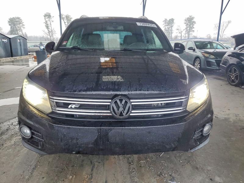 Photo 5 from auction – 2014 VOLKSWAGEN TIGUAN with VIN WVGAV3AXXEW034353