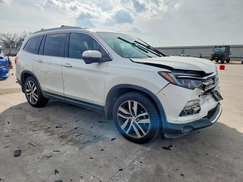 Photo 4 from auction – 2018 HONDA PILOT TOUR with VIN 5FNYF5H93JB022627
