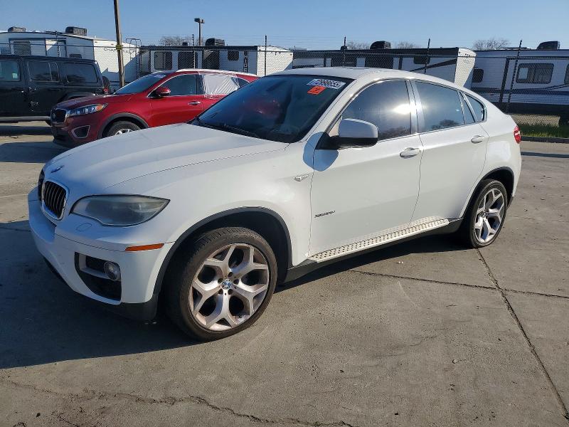 BMW X6 XDRIVE3 2014 with VIN 5UXFG2C59E0C45140 - Photo from auction