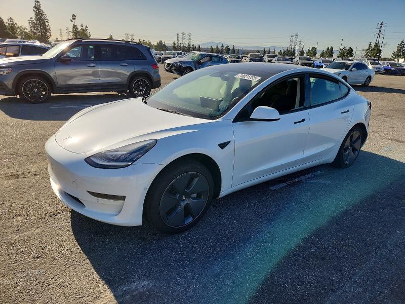 TESLA MODEL 3 2022 with VIN 5YJ3E1EA8NF299235 - Photo from auction