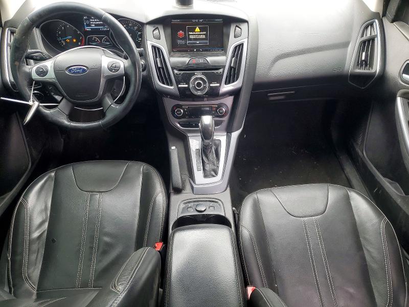 Photo 8 from auction – 2014 FORD FOCUS with VIN 1FADP3J25EL234872