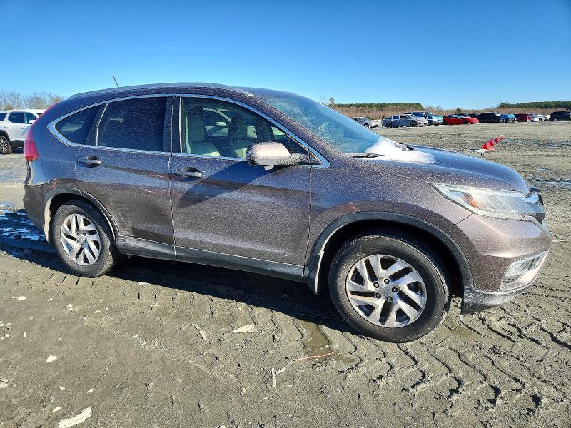Photo 4 from auction – 2016 HONDA CR-V with VIN 2HKRM3H75GH515815