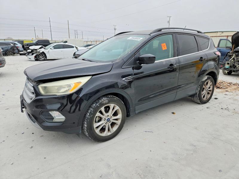 FORD ESCAPE 2018 with VIN 1FMCU0GD9JUA63792 - Photo from auction