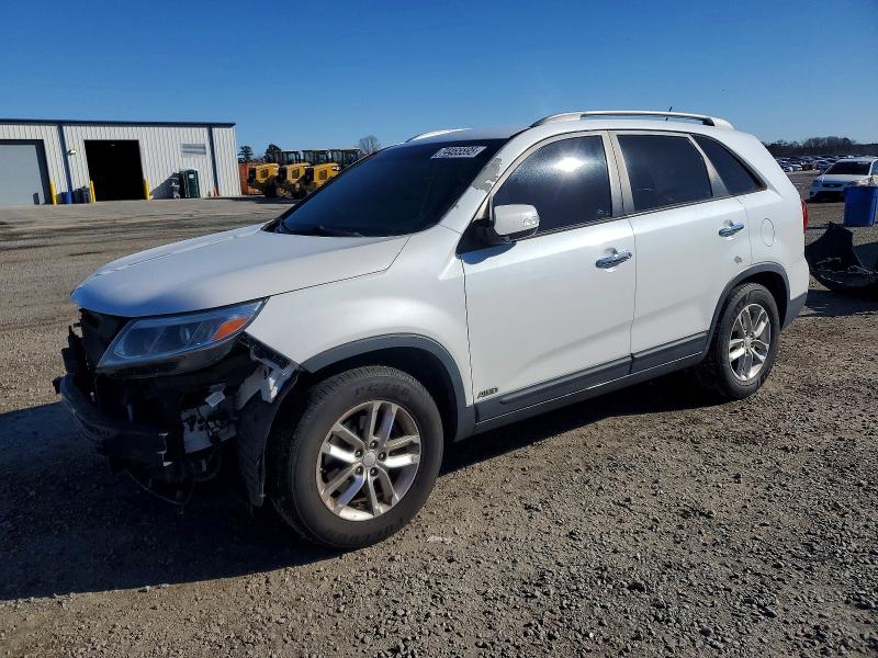 KIA SORENTO LX 2015 with VIN 5XYKTCA69FG586575 - Photo from auction