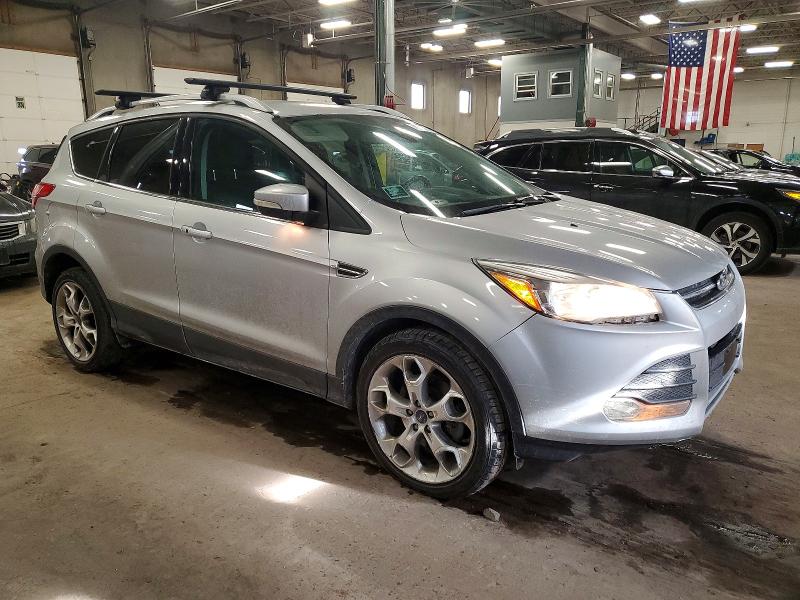 Photo 4 from auction – 2014 FORD ESCAPE TIT with VIN 1FMCU0J95EUB63219