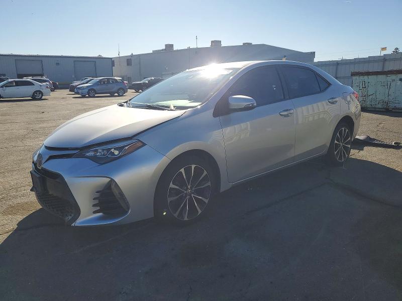 TOYOTA COROLLA 2017 with VIN 2T1BURHE0HC932878 - Photo from auction